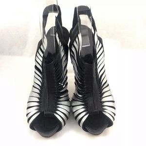 Alexander McQueen strappy sandal bootie.